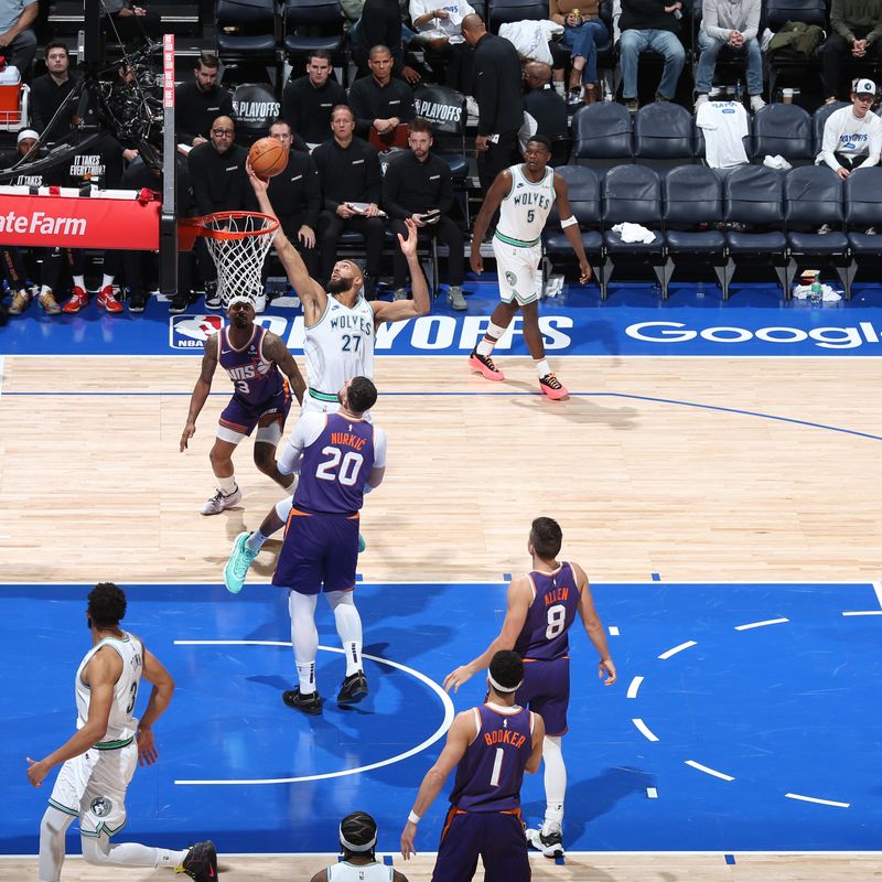 MINNEAPOLIS, MN -  APRIL 20: Rudy Gobert #27 of the Minnesota Timberwolves drives to the basket during the game against the Phoenix Suns during Round 1 Game 1 of the 2024 NBA Playoffs on April 20, 2024 at Target Center in Minneapolis, Minnesota. NOTE TO USER: User expressly acknowledges and agrees that, by downloading and or using this Photograph, user is consenting to the terms and conditions of the Getty Images License Agreement. Mandatory Copyright Notice: Copyright 2024 NBAE (Photo by David Sherman/NBAE via Getty Images)