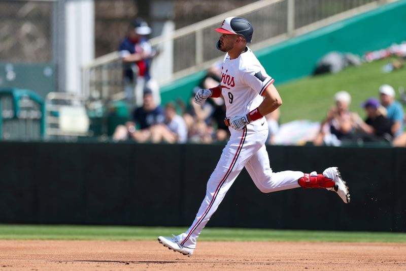 Feb 27, 2026; Fort Myers, Florida, USA; Minnesota Twins right fielder Trevor Larnach (9) runs the bases after hitting a home run against the New York Yankees in the first inning during spring training at Lee Health Sports Complex/Hammond Stadium. Mandatory Credit: Nathan Ray Seebeck-Imagn Images