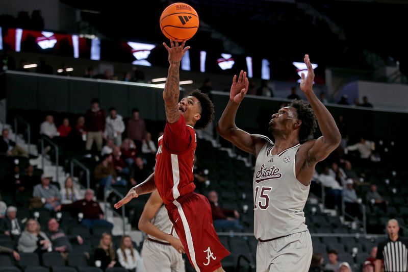 Jan 13, 2026; Starkville, Mississippi, USA; Alabama Crimson Tide guard Jalil Bethea (1) shoots as Mississippi State Bulldogs center Quincy Ballard (15) defends during the second half at Humphrey Coliseum. Mandatory Credit: Petre Thomas-Imagn Images