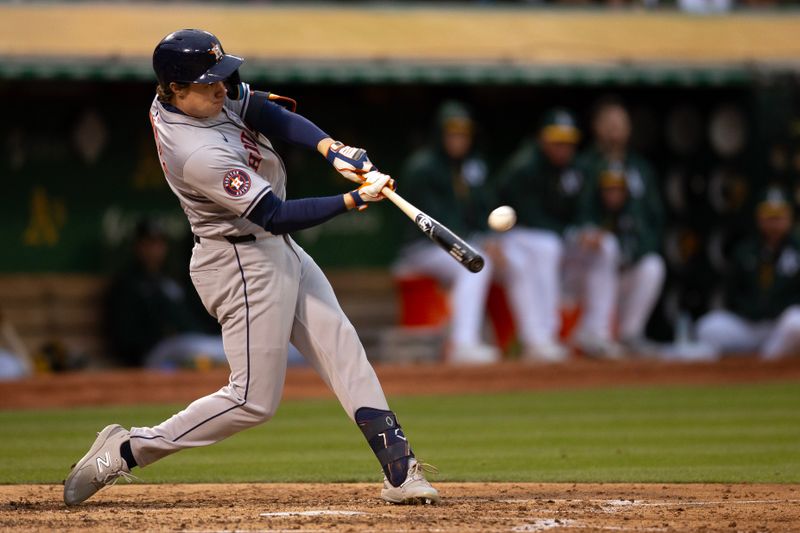 May 24, 2024; Oakland, California, USA; Houston Astros center fielder Jake Meyers (6) connects for a three-run home run against the Oakland Athletics during the fourth inning at Oakland-Alameda County Coliseum. Mandatory Credit: D. Ross Cameron-USA TODAY Sports