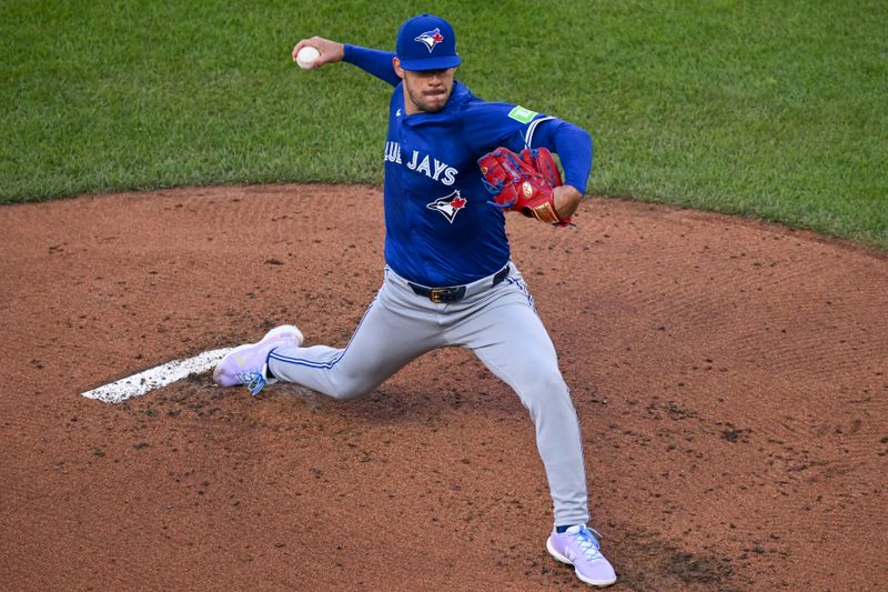 May 13, 2024; Baltimore, Maryland, USA;  Toronto Blue Jays pitcher José Berríos (17) throws a first inning pitch against the Baltimore Orioles at Oriole Park at Camden Yards. Mandatory Credit: Tommy Gilligan-USA TODAY Sports