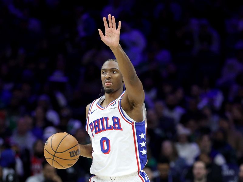 PHILADELPHIA, PENNSYLVANIA - FEBRUARY 02: Tyrese Maxey #0 of the Philadelphia 76ers dribbles the ball during a game against the Boston Celtics at the Wells Fargo Center on February 02, 2025 in Philadelphia, Pennsylvania. NOTE TO USER: User expressly acknowledges and agrees that, by downloading and or using this photograph, User is consenting to the terms and conditions of the Getty Images License Agreement. (Photo by Emilee Chinn/Getty Images)