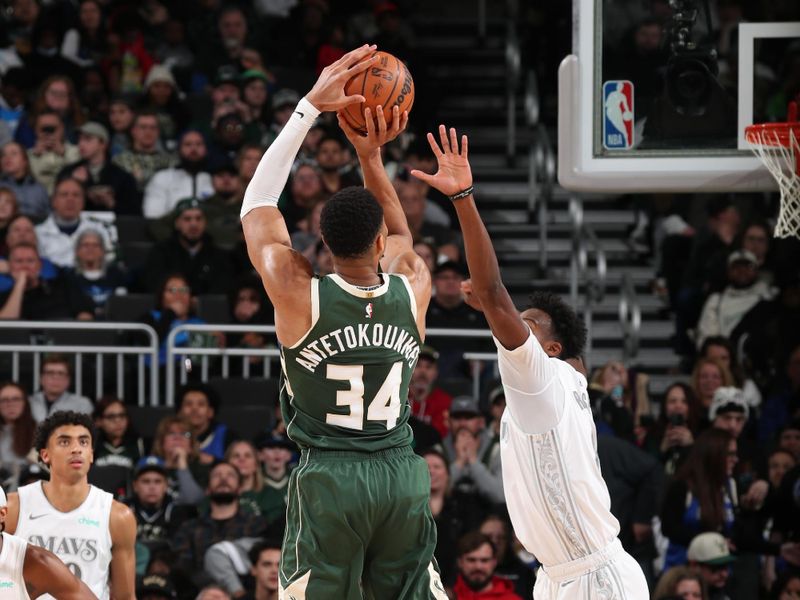 MILWAUKEE, WI - MARCH 5: Giannis Antetokounmpo #34 of the Milwaukee Bucks shoots a three point basket during the game against the Dallas Mavericks on March 5, 2025 at Fiserv Forum Center in Milwaukee, Wisconsin. NOTE TO USER: User expressly acknowledges and agrees that, by downloading and or using this Photograph, user is consenting to the terms and conditions of the Getty Images License Agreement. Mandatory Copyright Notice: Copyright 2025 NBAE (Photo by Gary Dineen/NBAE via Getty Images).