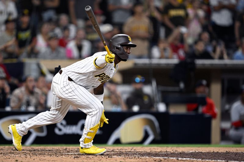 Jun 24, 2024; San Diego, California, USA; San Diego Padres left fielder Jurickson Profar (10) hits a two-RBI walk-off double against the Washington Nationals during the tenth inning at Petco Park. Mandatory Credit: Orlando Ramirez-USA TODAY Sports