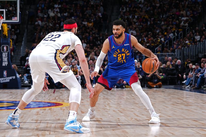 DENVER, CO - JANUARY 12: Jamal Murray #27 of the Denver Nuggets dribbles the ball during the game against the New Orleans Pelicans on January 12, 2024 at the Ball Arena in Denver, Colorado. NOTE TO USER: User expressly acknowledges and agrees that, by downloading and/or using this Photograph, user is consenting to the terms and conditions of the Getty Images License Agreement. Mandatory Copyright Notice: Copyright 2024 NBAE (Photo by Garrett Ellwood/NBAE via Getty Images)