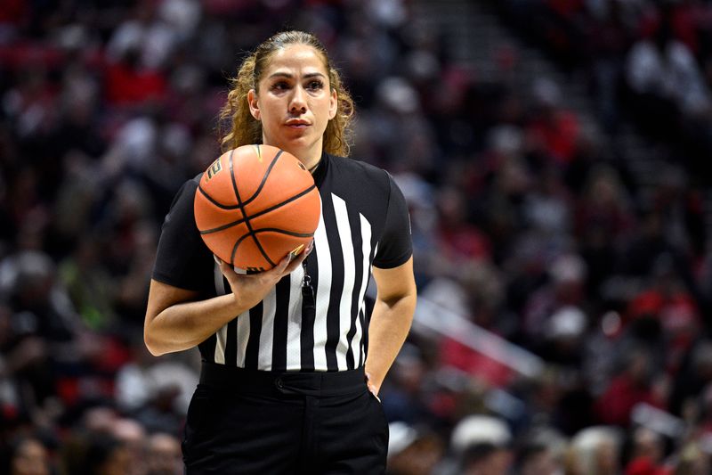 Jan 6, 2024; San Diego, California, USA; NCAA referee Kristyne Esparza looks on during the first half between the San Diego State Aztecs and the UNLV Rebels at Viejas Arena. Mandatory Credit: Orlando Ramirez-USA TODAY Sports