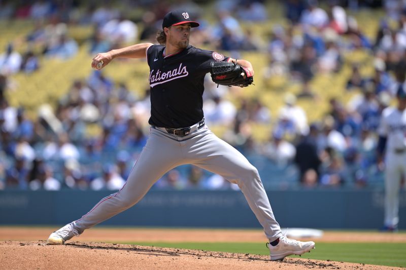 Apr 17, 2024; Los Angeles, California, USA; Washington Nationals pitcher Jake Irvin (27) throws to the plate in the third inning against the Los Angeles Dodgers at Dodger Stadium. Mandatory Credit: Jayne Kamin-Oncea-USA TODAY Sports