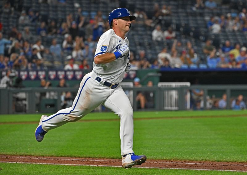 Sep 19, 2023; Kansas City, Missouri, USA; Kansas City Royals catcher Tyler Cropley (79) runs down the first base line after hitting his first Major League hit in the eighth inning against the Cleveland Guardians at Kauffman Stadium. Mandatory Credit: Peter Aiken-USA TODAY Sports