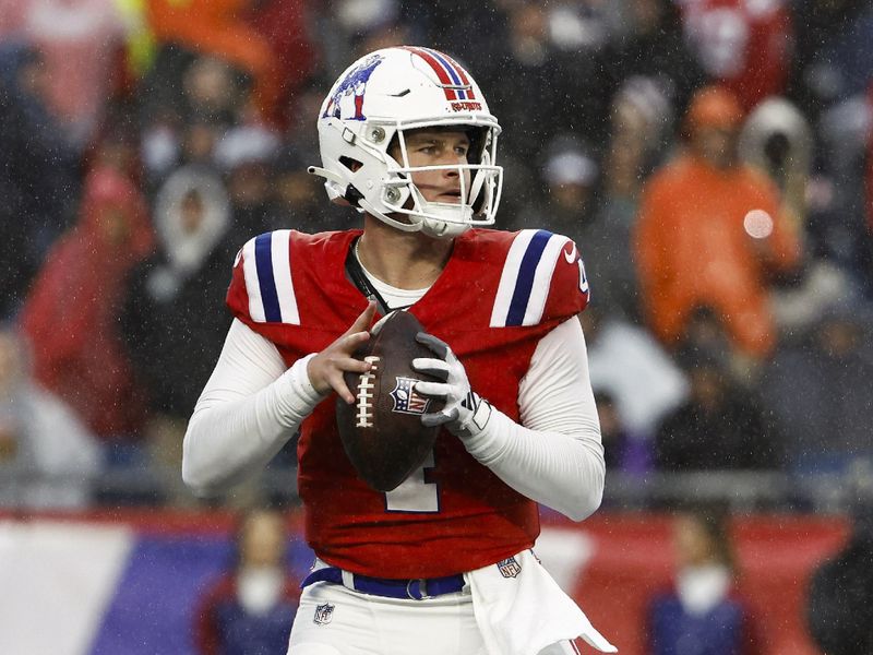 New England Patriots quarterback Bailey Zappe looks to pass against the Los Angeles Chargers during an NFL football game at Gillette Stadium, Sunday, Dec. 3, 2023 in Foxborough, Mass. (Winslow Townson/AP Images for Panini)