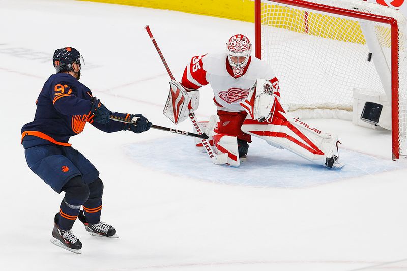 Feb 15, 2023; Edmonton, Alberta, CAN; Edmonton Oilers forward Connor McDavid (97) scores during the shoot-out against Detroit Red Wings goaltender Ville Husso (35) at Rogers Place. Mandatory Credit: Perry Nelson-USA TODAY Sports