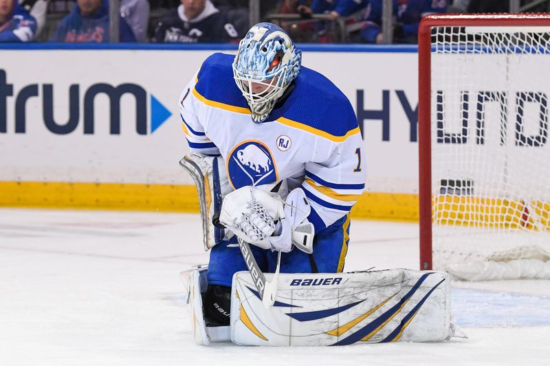 Dec 23, 2023; New York, New York, USA; Buffalo Sabres goaltender Ukko-Pekka Luukkonen (1) makes a save against the New York Rangers during the first period at Madison Square Garden. Mandatory Credit: Dennis Schneidler-USA TODAY Sports