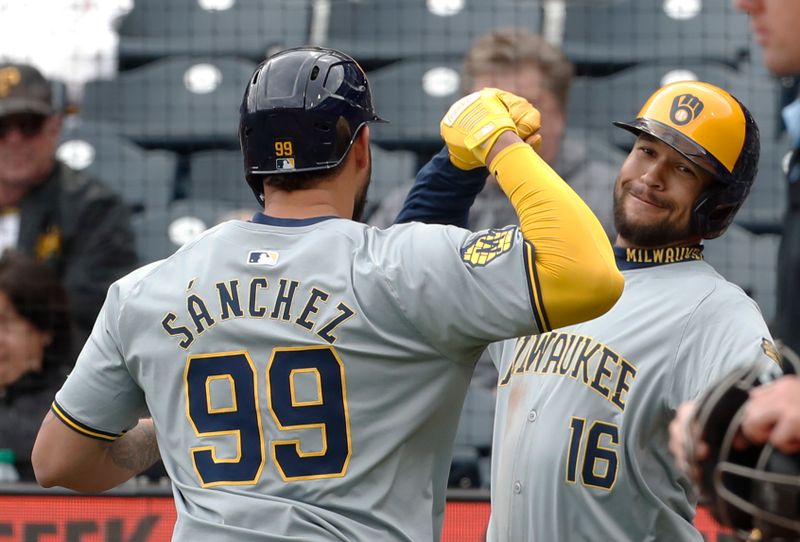 Apr 25, 2024; Pittsburgh, Pennsylvania, USA;  Milwaukee Brewers pinch hitter Gary Sánchez (99) celebrates his two run home run with center fielder Blake Perkins (16) against the Pittsburgh Pirates during the eighth inning at PNC Park. The Brewers won 7-5. Mandatory Credit: Charles LeClaire-USA TODAY Sports