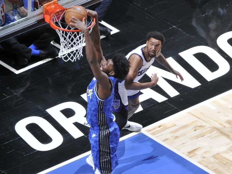 ORLANDO, FL - MARCH 23: Jonathan Isaac #1 of the Orlando Magic dunks the ball during the game against the Sacramento Kings on March 23, 2024 at the Kia Center in Orlando, Florida. NOTE TO USER: User expressly acknowledges and agrees that, by downloading and or using this photograph, User is consenting to the terms and conditions of the Getty Images License Agreement. Mandatory Copyright Notice: Copyright 2024 NBAE (Photo by Fernando Medina/NBAE via Getty Images)