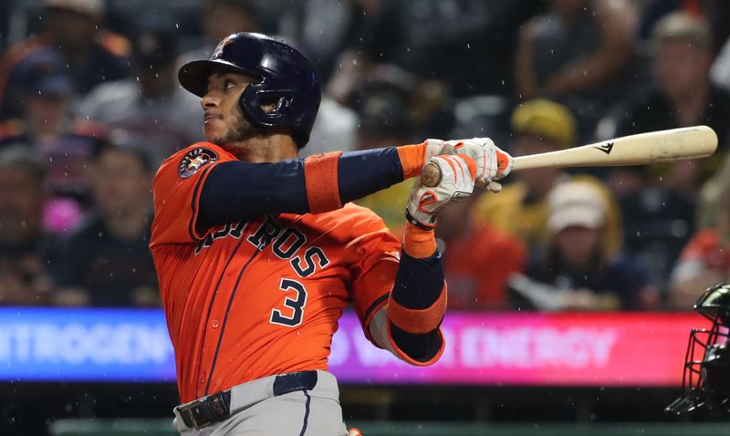 Jun 5, 2025; Pittsburgh, Pennsylvania, USA;  Houston Astros shortstop Jeremy Pena (3) hits an RBI double against the Pittsburgh Pirates during the seventh inning at PNC Park. Mandatory Credit: Charles LeClaire-Imagn Images