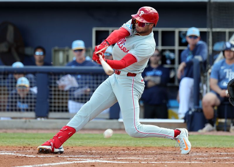 Feb 25, 2025; Port Charlotte, Florida, USA;  Philadelphia Phillies outfielder Justin Crawford (80) breaks his bat as he reaches on a fielders choice against the Tampa Bay Rays during the fourth inning at Charlotte Sports Park. Mandatory Credit: Kim Klement Neitzel-Imagn Images