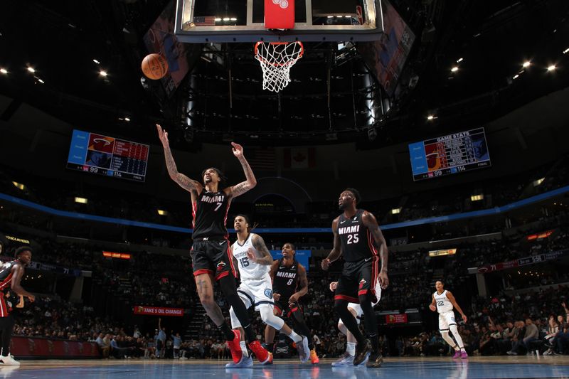 MEMPHIS, TN - OCTOBER 18: Kel'el Ware #7 of the Miami Heat goes up for the rebound during the game against the Memphis Grizzlies during a NBA pre season game on October 18, 2024 at FedExForum in Memphis, Tennessee. NOTE TO USER: User expressly acknowledges and agrees that, by downloading and or using this photograph, User is consenting to the terms and conditions of the Getty Images License Agreement. Mandatory Copyright Notice: Copyright 2024 NBAE (Photo by Joe Murphy/NBAE via Getty Images)