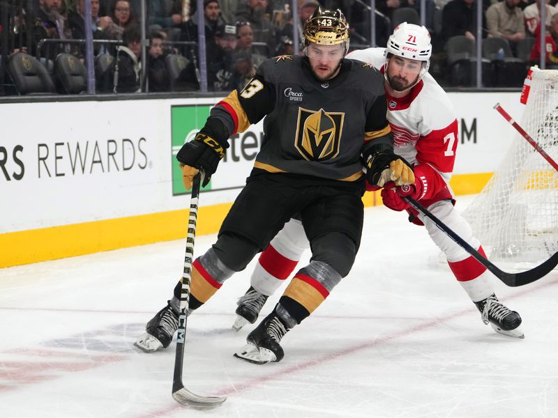 Jan 19, 2023; Las Vegas, Nevada, USA; Vegas Golden Knights center Paul Cotter (43) controls the puck in front of Detroit Red Wings center Dylan Larkin (71) during the second period at T-Mobile Arena. Mandatory Credit: Stephen R. Sylvanie-USA TODAY Sports