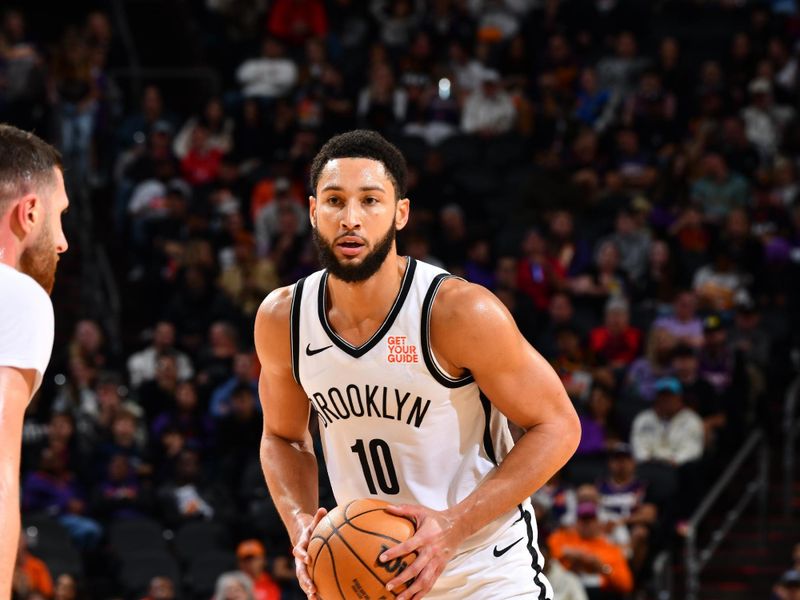 PHOENIX, AZ - NOVEMBER 27: Ben Simmons #10 of the Brooklyn Nets looks to pass the ball during the game against the Phoenix Suns on November 27, 2024 at Footprint Center in Phoenix, Arizona. NOTE TO USER: User expressly acknowledges and agrees that, by downloading and or using this photograph, user is consenting to the terms and conditions of the Getty Images License Agreement. Mandatory Copyright Notice: Copyright 2024 NBAE (Photo by Barry Gossage/NBAE via Getty Images)