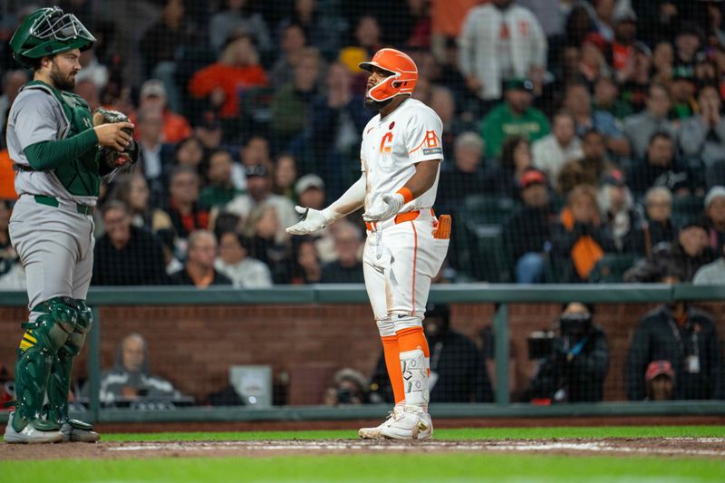 Jul 30, 2024; San Francisco, California, USA;  San Francisco Giants center fielder Heliot Ramos (17) reacts after being ejected by umpire Chris Segal (96) against the Oakland Athletics during the seventh inning at Oracle Park. Mandatory Credit: Neville E. Guard-USA TODAY Sports