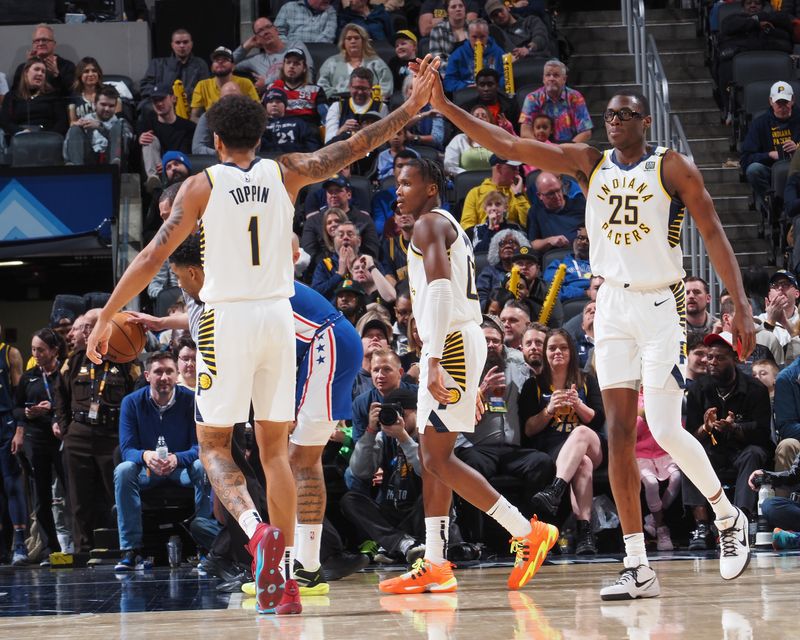 INDIANAPOLIS, IN - JANUARY 25:  Obi Toppin #1 of the Indiana Pacers & Jalen Smith #25 of the Indiana Pacers high five during the game on January 25, 2024 at Gainbridge Fieldhouse in Indianapolis, Indiana. NOTE TO USER: User expressly acknowledges and agrees that, by downloading and or using this Photograph, user is consenting to the terms and conditions of the Getty Images License Agreement. Mandatory Copyright Notice: Copyright 2024 NBAE (Photo by Ron Hoskins/NBAE via Getty Images)