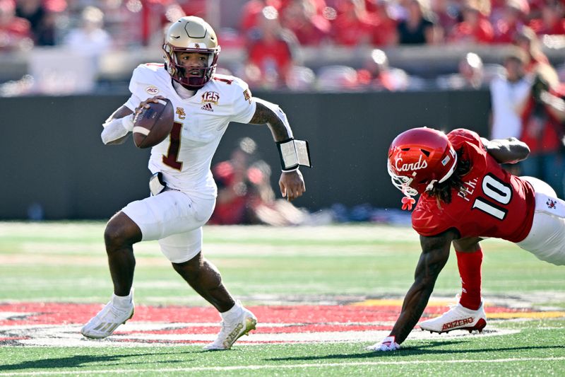 Sep 23, 2023; Louisville, Kentucky, USA;  Boston College Eagles quarterback Thomas Castellanos (1) scrambles with the ball against Louisville Cardinals defensive back Benjamin Perry (10) during the first half at L&N Federal Credit Union Stadium. Mandatory Credit: Jamie Rhodes-USA TODAY Sports