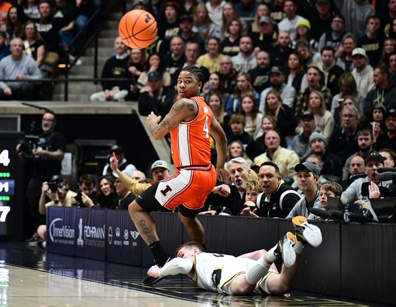 Jan 5, 2024; West Lafayette, Indiana, USA; Illinois Fighting Illini guard Justin Harmon (4) looks back at a referee after he and Purdue Boilermakers guard Braden Smith (3) attempted to save a ball from going out of bounds during the first half at Mackey Arena. Mandatory Credit: Marc Lebryk-USA TODAY Sports