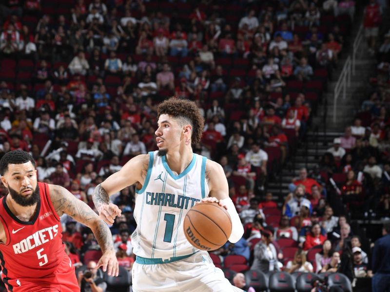 HOUSTON, TX - OCTOBER 23:  LaMelo Ball #1 of the Charlotte Hornets drives to the basket during the game against the Houston Rockets during a regular season game on October 23, 2024 at the Toyota Center in Houston, Texas. NOTE TO USER: User expressly acknowledges and agrees that, by downloading and or using this photograph, User is consenting to the terms and conditions of the Getty Images License Agreement. Mandatory Copyright Notice: Copyright 2024 NBAE (Photo by Logan Riely/NBAE via Getty Images)