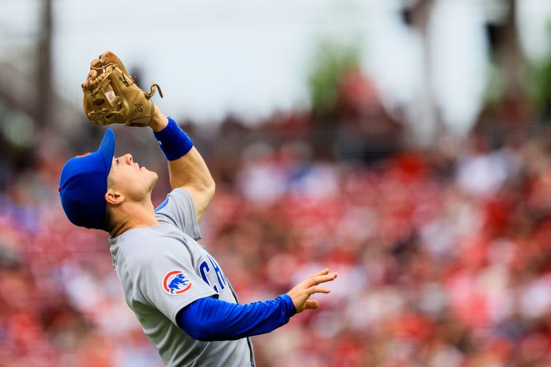 May 25, 2025; Cincinnati, Ohio, USA; Chicago Cubs third baseman Matt Shaw (6) catches a pop up hit by Cincinnati Reds outfielder Austin Hays (not pictured) in the third inning at Great American Ball Park. Mandatory Credit: Katie Stratman-Imagn Images