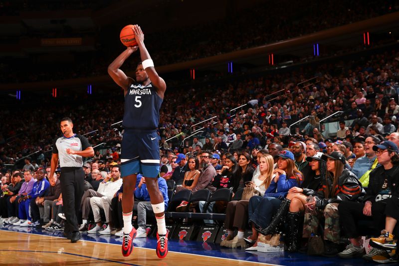 NEW YORK, NY - OCTOBER 13: Anthony Edwards #5 of the Minnesota Timberwolves shoots a three point basket during the game on October 13, 2024 at Madison Square Garden in New York City, New York.  NOTE TO USER: User expressly acknowledges and agrees that, by downloading and or using this photograph, User is consenting to the terms and conditions of the Getty Images License Agreement. Mandatory Copyright Notice: Copyright 2024 NBAE  (Photo by David L. Nemec/NBAE via Getty Images)