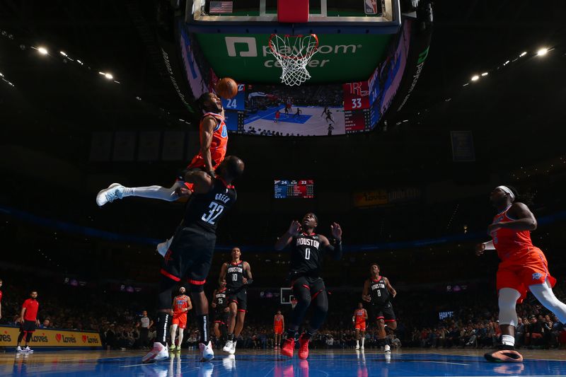 OKLAHOMA CITY, OK - MARCH 27:  Isaiah Joe #11 of the Oklahoma City Thunder dunks the ball during the game against the Houston Rockets on March 27, 2024 at Paycom Arena in Oklahoma City, Oklahoma. NOTE TO USER: User expressly acknowledges and agrees that, by downloading and or using this photograph, User is consenting to the terms and conditions of the Getty Images License Agreement. Mandatory Copyright Notice: Copyright 2024 NBAE (Photo by Zach Beeker/NBAE via Getty Images)