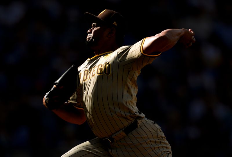 Jun 1, 2024; Kansas City, Missouri, USA; San Diego Padres relief pitcher Robert Suarez (75) pitches during the ninth inning against the Kansas City Royals at Kauffman Stadium. Mandatory Credit: Jay Biggerstaff-USA TODAY Sports