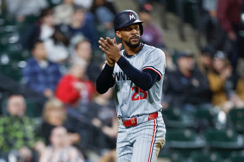 Apr 29, 2024; Chicago, Illinois, USA; Minnesota Twins outfielder Byron Buxton (25) celebrates after scoring against the Chicago White Sox during the ninth inning at Guaranteed Rate Field. Mandatory Credit: Kamil Krzaczynski-USA TODAY Sports