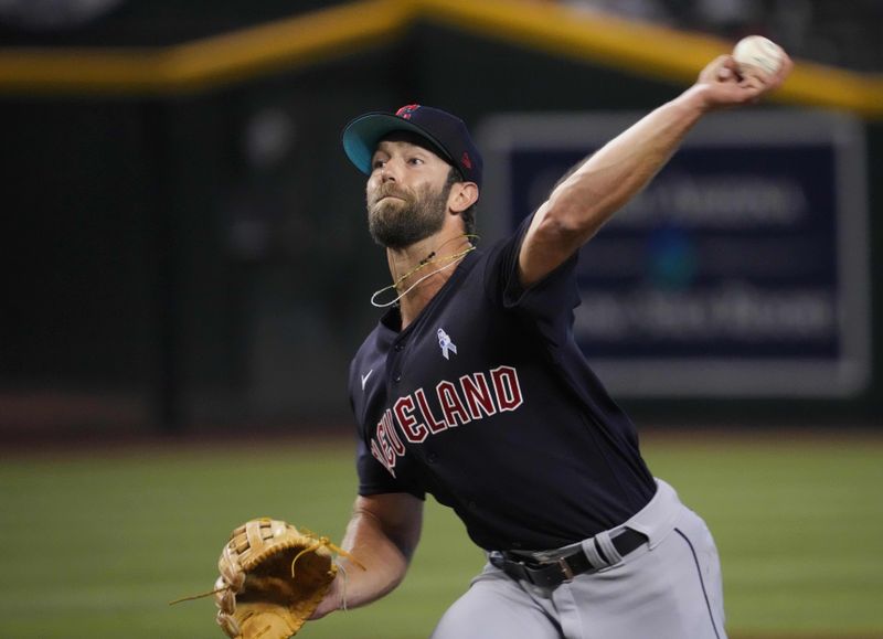 Jun 18, 2023; Phoenix, Arizona, USA; Cleveland Guardians relief pitcher Daniel Norris (53) pitches against the Arizona Diamondbacks during the ninth inning at Chase Field. Mandatory Credit: Joe Camporeale-USA TODAY Sports