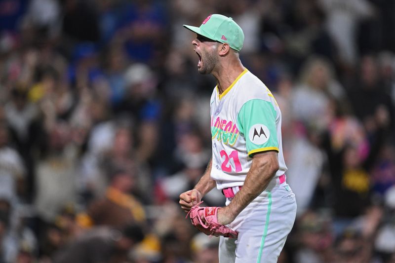 Jul 7, 2023; San Diego, California, USA; San Diego Padres relief pitcher Nick Martinez (21) reacts after an inning-ending double play in the ninth inning against the New York Mets at Petco Park. Mandatory Credit: Orlando Ramirez-USA TODAY Sports