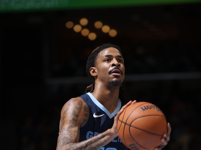 MEMPHIS, TN - FEBRUARY 3:  Ja Morant #12 of the Memphis Grizzlies shoots a free throw during the game against the San Antonio Spurs on February 3, 2025 at FedExForum in Memphis, Tennessee. NOTE TO USER: User expressly acknowledges and agrees that, by downloading and or using this photograph, User is consenting to the terms and conditions of the Getty Images License Agreement. Mandatory Copyright Notice: Copyright 2025 NBAE (Photo by Joe Murphy/NBAE via Getty Images)