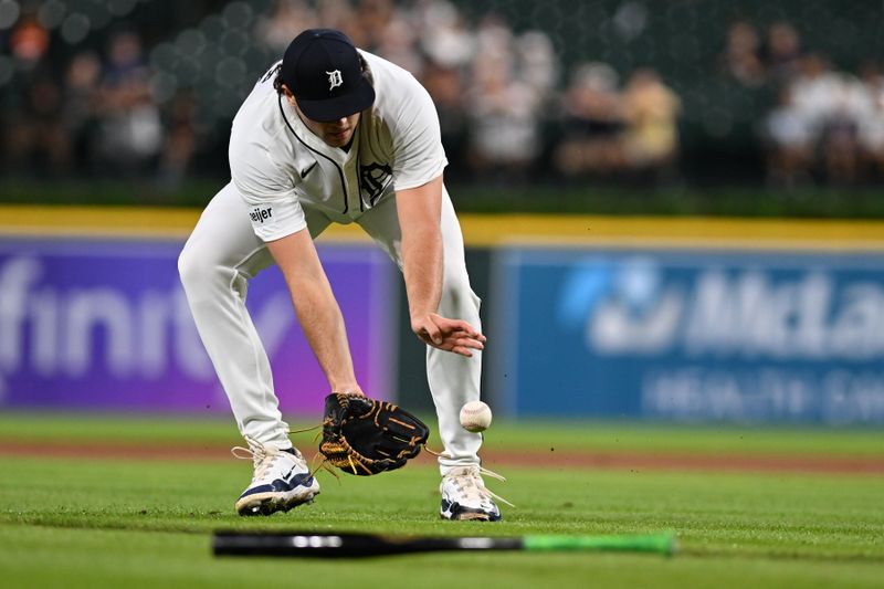 Aug 27, 2024; Detroit, Michigan, USA;  Detroit Tigers starting pitcher Brant Hurter (48) feels a ground ball in front of the mound against the Los Angeles Angels in the second inning at Comerica Park. Mandatory Credit: Lon Horwedel-USA TODAY Sports