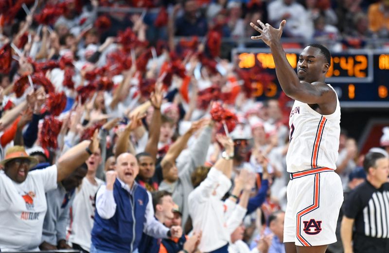 Feb 11, 2023; Auburn, Alabama, USA;  Auburn Tigers forward Jaylin Williams (2) celebrates a three-point basket against the Alabama Crimson Tide at Neville Arena. Mandatory Credit: Julie Bennett-USA TODAY Sports

