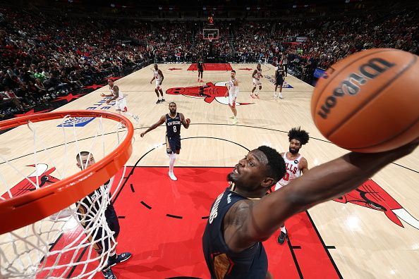 CHICAGO, IL - DECEMBER 2: Zion Williamson #1 of the New Orleans Pelicans dunks the ball during the game against the Chicago Bulls on December 2, 2023 at United Center in Chicago, Illinois. NOTE TO USER: User expressly acknowledges and agrees that, by downloading and or using this photograph, User is consenting to the terms and conditions of the Getty Images License Agreement. Mandatory Copyright Notice: Copyright 2023 NBAE (Photo by Jeff Haynes/NBAE via Getty Images)