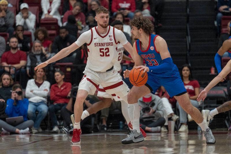 Mar 1, 2025; Stanford, California, USA;  Stanford Cardinal forward Aidan Cammann (52) defends during the first half against Southern Methodist Mustangs forward Matt Cross (33) at Maples Pavilion. Mandatory Credit: Stan Szeto-Imagn Images