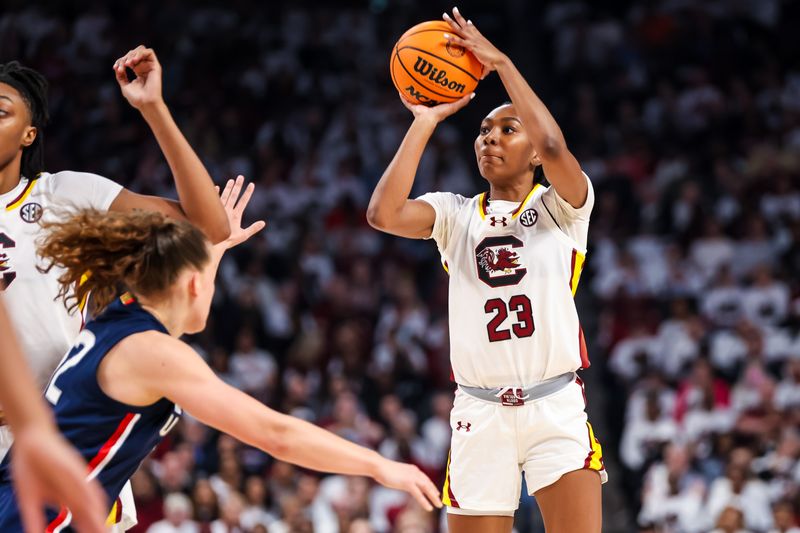 Feb 11, 2024; Columbia, South Carolina, USA; South Carolina Gamecocks guard Bree Hall (23) shoots against the UConn Huskies in the first half at Colonial Life Arena. Mandatory Credit: Jeff Blake-USA TODAY Sports