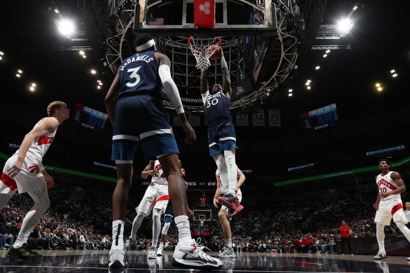 MINNEAPOLIS, MN -  OCTOBER 22: Julius Randle #30 of the Minnesota Timberwolves dunks the ball during the game against the Toronto Raptors on October 22, 2024 at Target Center in Minneapolis, Minnesota. NOTE TO USER: User expressly acknowledges and agrees that, by downloading and or using this Photograph, user is consenting to the terms and conditions of the Getty Images License Agreement. Mandatory Copyright Notice: Copyright 2024 NBAE (Photo by Jordan Johnson/NBAE via Getty Images)