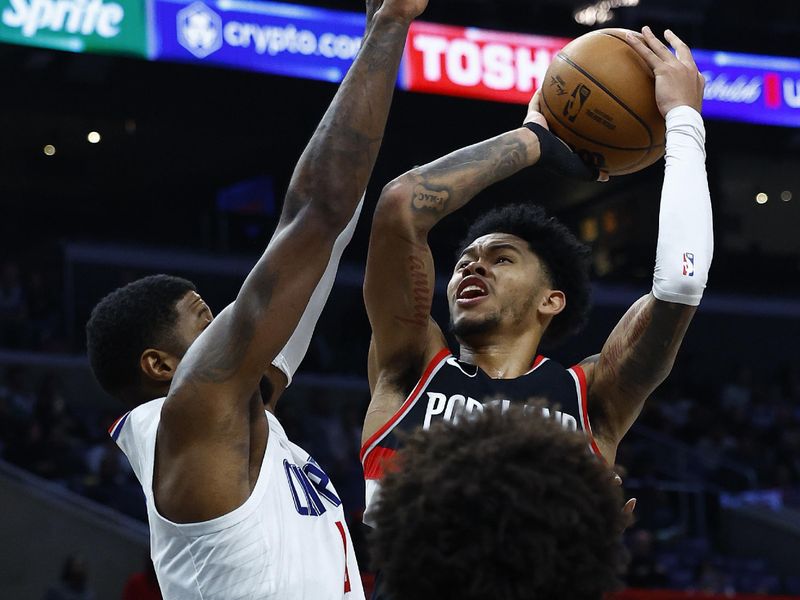 LOS ANGELES, CALIFORNIA - DECEMBER 11:  Anfernee Simons #1 of the Portland Trail Blazers takes a shot against Paul George #13 of the LA Clippers in the second half at Crypto.com Arena on December 11, 2023 in Los Angeles, California.  NOTE TO USER: User expressly acknowledges and agrees that, by downloading and/or using this photograph, user is consenting to the terms and conditions of the Getty Images License Agreement. (Photo by Ronald Martinez/Getty Images)