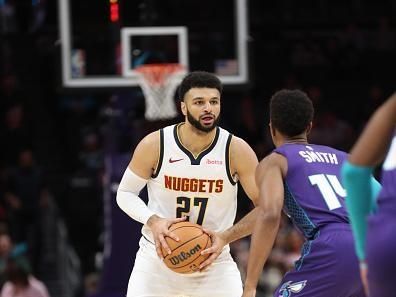 CHARLOTTE, NC - DECEMBER 23: Jamal Murray #27 of the Denver Nuggets handles the ball during the game against the Charlotte Hornets on December 23, 2023 at Spectrum Center in Charlotte, North Carolina. NOTE TO USER: User expressly acknowledges and agrees that, by downloading and or using this photograph, User is consenting to the terms and conditions of the Getty Images License Agreement.  Mandatory Copyright Notice:  Copyright 2023 NBAE (Photo by Brock Williams-Smith/NBAE via Getty Images)