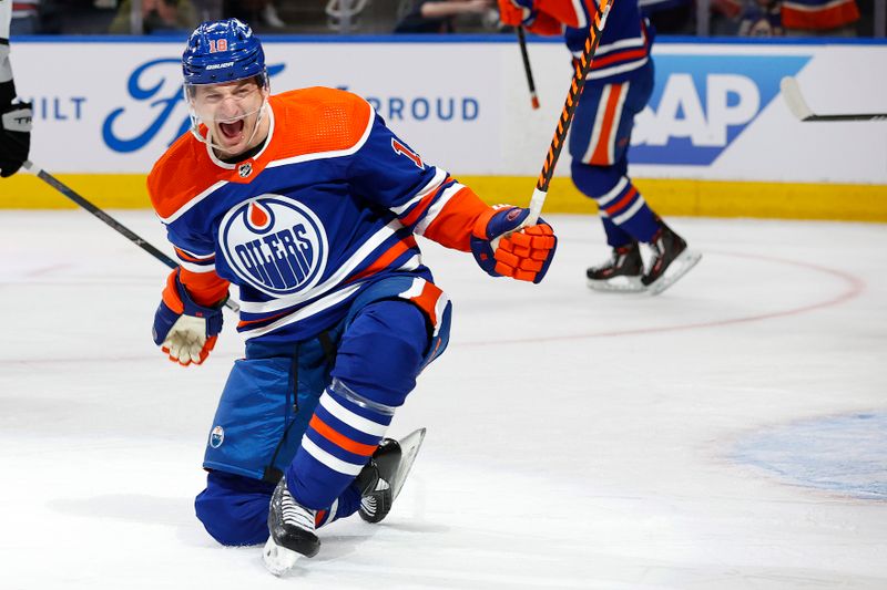 Apr 22, 2024; Edmonton, Alberta, CAN; Edmonton Oilers forward Zach Hyman (18) celebrates after scoring a goal during the first period against the Los Angeles Kings in game one of the first round of the 2024 Stanley Cup Playoffs at Rogers Place. Mandatory Credit: Perry Nelson-USA TODAY Sports