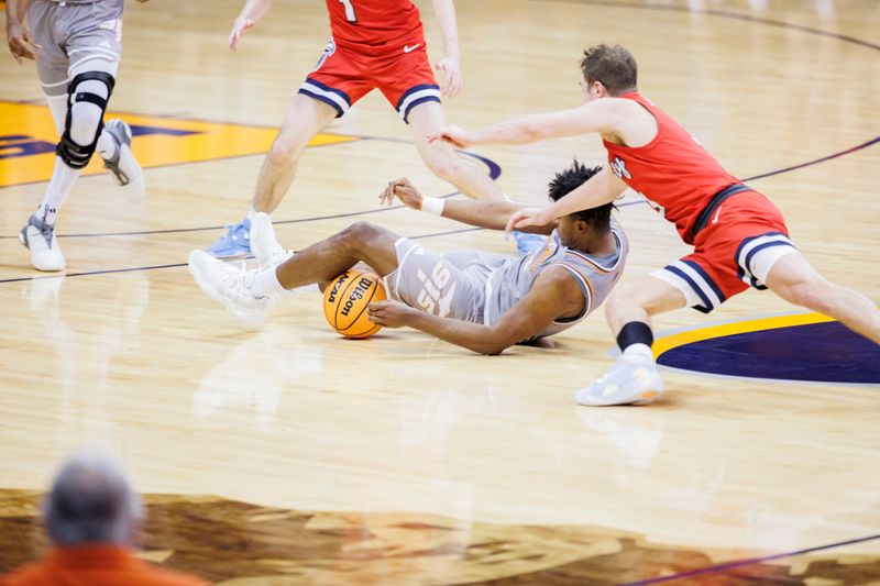 Feb 3, 2024; El Paso, Texas, USA; UTEP Miners guard Otis Frazier III (23) and Liberty University Flames guard Kaden Metheny (3) battle for a loose ball in the second half at Don Haskins Center. Mandatory Credit: Ivan Pierre Aguirre-USA TODAY Sports