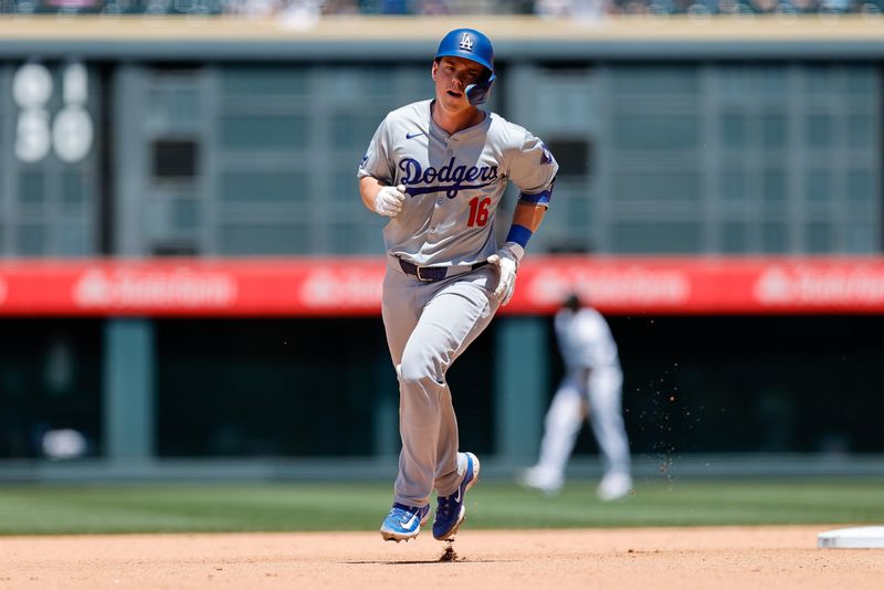 Jun 20, 2024; Denver, Colorado, USA; Los Angeles Dodgers catcher Will Smith (16) rounds the bases on a solo home run in the fourth inning against the Colorado Rockies at Coors Field. Mandatory Credit: Isaiah J. Downing-USA TODAY Sports