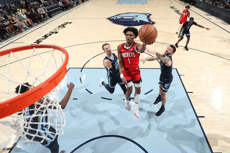 MEMPHIS, TN - FEBRUARY 14: Amen Thompson #1 of the Houston Rockets drives to the basket during the game against the Memphis Grizzlies on February 14, 2024 at FedExForum in Memphis, Tennessee. NOTE TO USER: User expressly acknowledges and agrees that, by downloading and or using this photograph, User is consenting to the terms and conditions of the Getty Images License Agreement. Mandatory Copyright Notice: Copyright 2024 NBAE (Photo by Joe Murphy/NBAE via Getty Images)