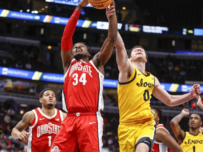 Mar 9, 2023; Chicago, IL, USA; Ohio State Buckeyes center Felix Okpara (34) battles for the ball with Iowa Hawkeyes forward Filip Rebraca (0) during the second half at United Center. Mandatory Credit: Kamil Krzaczynski-USA TODAY Sports