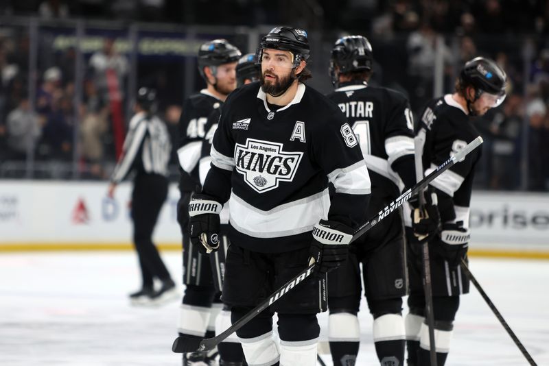 Nov 4, 2025; Los Angeles, California, USA;  Los Angeles Kings defenseman Drew Doughty (8) looks on after scoring an empty net goal during the third period against the Winnipeg Jets at Crypto.com Arena. Mandatory Credit: Kiyoshi Mio-Imagn Images