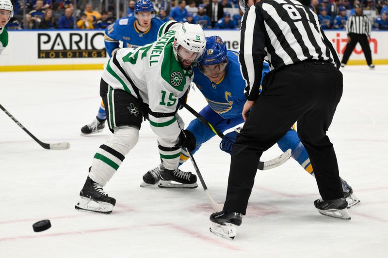 Jan 25, 2025; St. Louis, Missouri, USA; Dallas Stars center Colin Blackwell (15) and St. Louis Blues center Brayden Schenn (10) battle after a face-off during the second period at Enterprise Center. Mandatory Credit: Jeff Le-Imagn Images